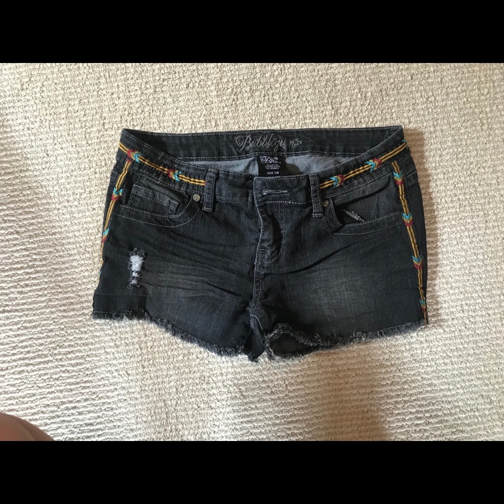 Cut offs with tribal detailing